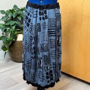 Reversible crinkle jersey skirt.
